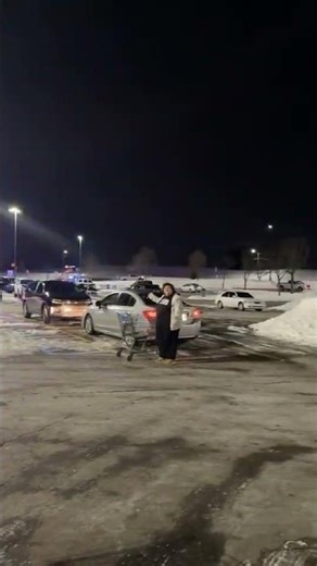 pickup truck does 100 in Walmart parking running from the police
