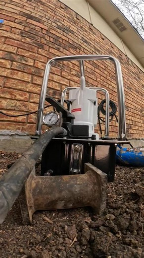 Why This Foundation Failed — And How We’re Fixing It This home had a previous foundation repair, but elevation data showed ongoing movement. During the repair, we load-tested the existing piers and documented low pressure readings — well below refusal. New piers were driven 19–22 feet deep and stopped between 8,400 and 9,000 PSI, where the structure began to lift. This video shows the real difference between installed piers and load-bearing piers. | IFIX Construction