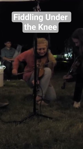 Natalie tried a little trick fiddling under the knee at the Weiser Fiddle Contest