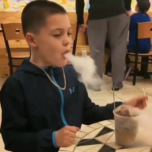 Physics Videos on Instagram: "Dragon Breath Ice Cream ❄️⠀ -⠀ Dragon's Breath is a frozen dessert made from cereal dipped in liquid nitrogen When placed in the eater's mouth, it produces vapors which comes out of the nose and mouth, giving the dessert its name.⠀ -⠀ Nitrogen, like all elements on earth, can be found in one of the three states of matter: solid, liquid, or gas. Nitrogen naturally occurs as a gas in our atmosphere. In fact, most of the air we breathe in is nitrogen (about 78 percent)