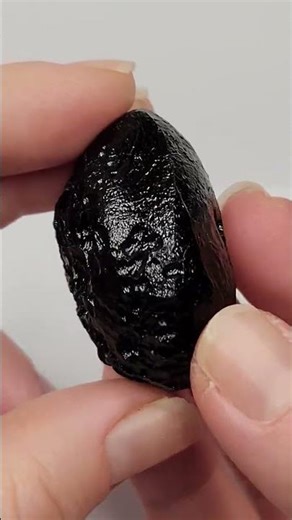 Tektite from Thailand with unique open bubble and extra glossy surface