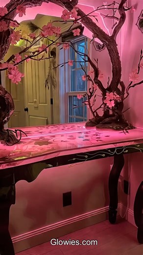 These cherry blossom tables are so cool! They’re made with glowing resin that lights up and shows cherry blossom branches inside. The flowers look like they’re floating, and the glow makes them shine like magic.The table tops have mirrors that sparkle and show off the glowing blossoms. They look really special and make any room feel fancy and fun. It’s like bringing a glowing cherry blossom tree into your home! | Glow Lockets by Monique Lula