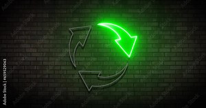 Animated bright green neon recycle logo on a brick wall. Nature pollution, recycling, clean energy.