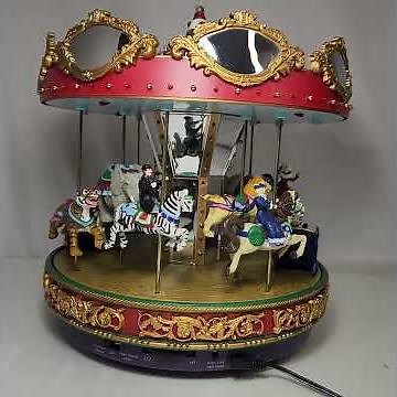 Mr. Christmas Marquee Merry Go Round. needs repair.
