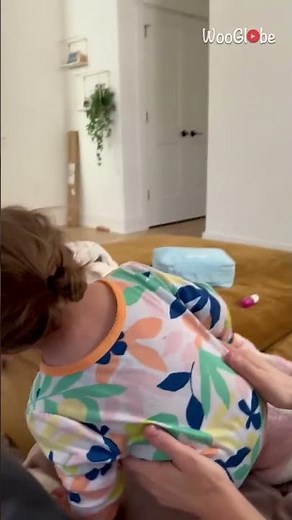 Cute little girl delightedly laughs when tickled by her mother || WooGlobe