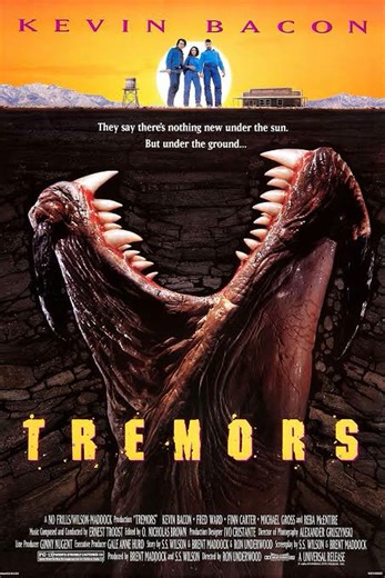 "Tremors" is an American monster horror film directed by Ron Underwood, produced by Brent Maddock and S. S. Wilson, written by Maddock, Wilson, and Underwood and starring Kevin Bacon, Fred Ward, Finn Carter, Michael Gross, and Reba McEntire. In the film, handymen Val McKee (Bacon) and Earl Bassett (Ward) wish to leave the small desert town of Perfection, Nevada, as they are tired of their dull lives. However, they happen upon a series of mysterious deaths and a concerned seismologist Rhonda (Car