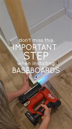Claire | Creatively.Clarified | DIY on Instagram: "Don’t miss this crucial step when installing baseboards! 📢 Glue those seams!!! Here’s how to get perfect corners every time: 1️⃣ Get a good miter cut – precision is key! 2️⃣ Glue the miter – for a seamless bond. 3️⃣ Tape the miter with painter’s tape – holds it tight while the glue sets. 4️⃣ Pin nail the miter joint – for extra security. 5️⃣ Install your baseboard to the wall or built-in. This can make all the difference, to prevent seams separ