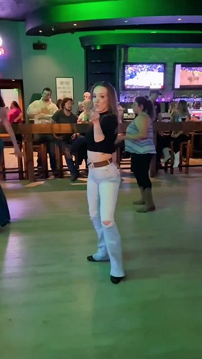 Dynamic Line Dance Performance with Spins and Musicality