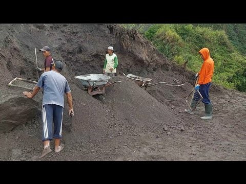 Collecting Sand While Waiting for the Truck to Arrive