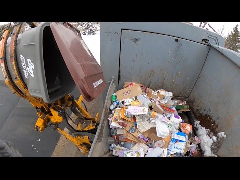 New Way Sidewinder Hopper View: Garbage Truck Packing out on Recycling!