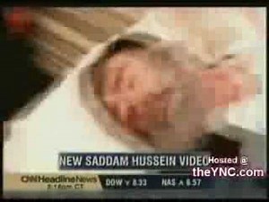 Footage of Saddam Hussein laying on the stretcher after being executed!