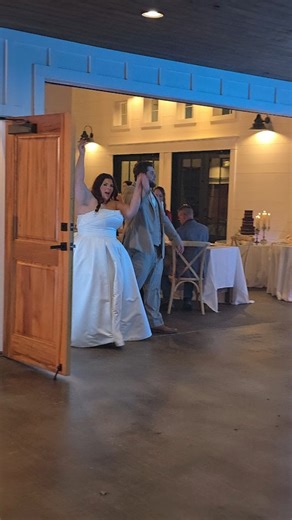 Let me tell you… Lilee and Russell did NOT come into their reception on quiet mode When I announced “Make some noise for Mr. & Mrs. England!” the crowd erupted and these two walked in smiling, glowing, and ready to celebrate. Before their first dance even started, they hit a quick lil 2-step like, “Yep, THIS is our night.” And honestly… that’s how it should be. Your entrance sets the tone for the whole reception... fun, love, energy, and a loving celebration. I loved watching how relaxed they we