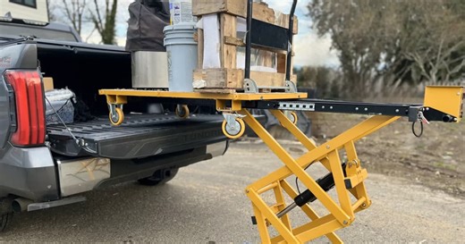 Cunning cargo cart packs its own powered lifting and sliding mechanism