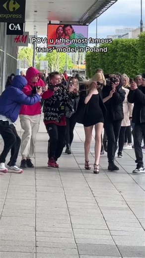 Aspiring Trans Model Walking the Runway in Poland