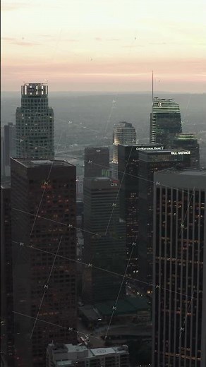 AERIAL: Breathtaking wide shot of Downtown Los Angeles, California Skyline at Sunset