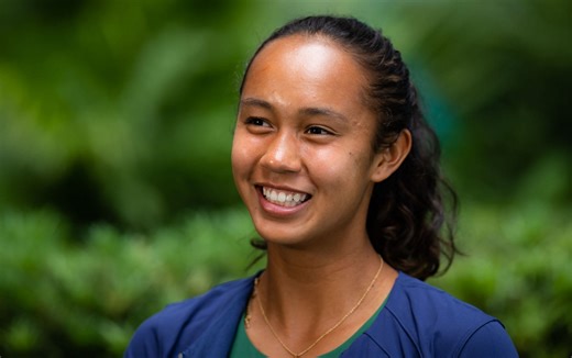 Leylah Fernandez can't stop smiling as she shows off her dance moves with hitting partner