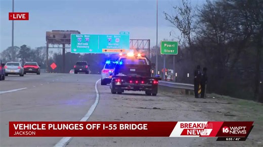 Car flips off I‑55 bridge near Pearl Street