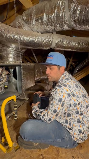 Installing an I-Wave whole house air purification system. | Burk Brothers HVAC