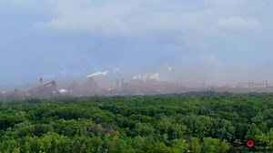 Check out the dust cloud rising from the Burns Harbor steel mill as the storms pass by. | Timeless Aerial Photography