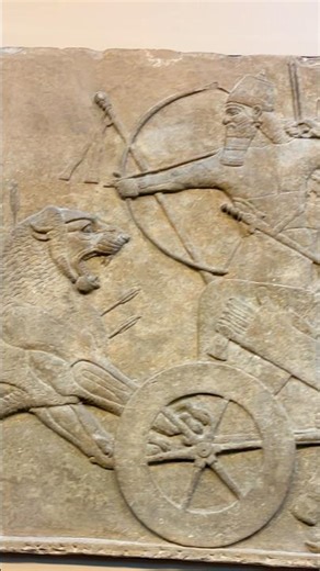 Assyrian Soldiers use a Siege Tower to storm a fortress #history