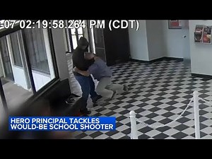 Dramatic Video: Principal hailed a hero after tackling would-be school shooter in Oklahoma