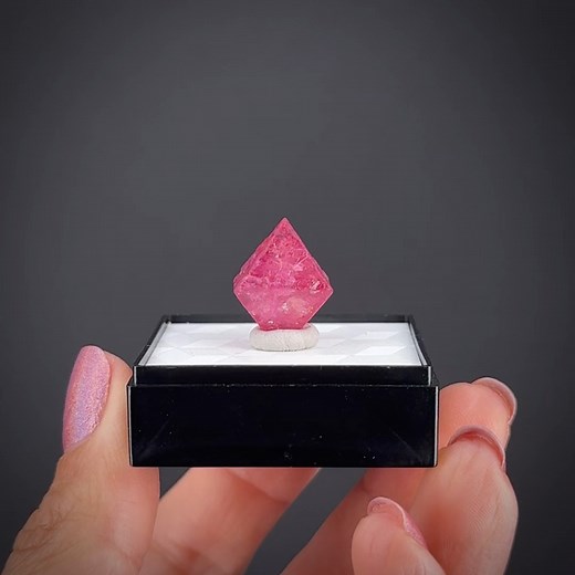 Spinel - Pein-Pyit, Mogok Township, Pyin-Oo-Lwin Dist., Mandalay Region, Myanmar More info: https://www.irocks.com/minerals/specimen/53433 This is a sharp, glassy, translucent spinel crystal, from this famous gemstone mining district. There are many spinels one can acquire from old finds generally, but the color on this is particularly open and bright and eye catching. The crystal is 22 carats, with a rich maroon color, not red and not purple, but somewhere in between. Mogok is complicated these