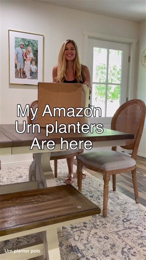 The perfect porch planters. Modern black urn pots. #frontporchplanters #planters #urn #plantpots