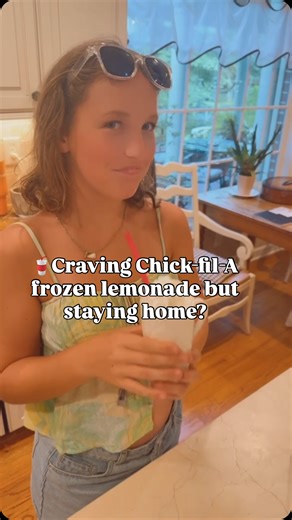 Why leave the house when you can make Chick-fil-A frozen lemonade at home? 🍋 = summer magic in a glass. Blended, frosty, and so satisfying. Save this recipe for those 95° days when the drive-thru feels too far. ☀️ #frozenlemonade #chickfilaathome #easyrecipe #homemadedrinks #summerhack #lemonaderecipe #refreshingdrinks #momsoftiktok #summermomlife | Emily Unscripted
