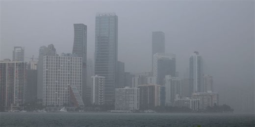 Miami roads flood after tropical moisture shatters daily rain record