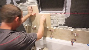 2.4M views · 157 shares | Tiling shower niche with travertine and glass mosaic...used wet saw for travertine L-shape...applied Mapei LHT on wall and tile with Euro trowel...kept glass mosaic in plastic while cutting and used 1/16” shims for proper spacing  | Home Repair Tutor | Facebook