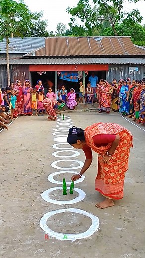 Who can get the bottle in the middle first? #reels #reelsvideo #dada #papi #eidreels | Rural Activities