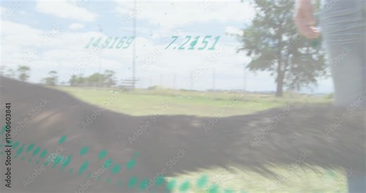 Trainer presenting bite sleeve, Shepherd leaping and gripping for K9 training, green dots tracking