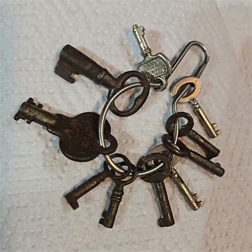 Cedar armoire altering a skeleton key to open lock