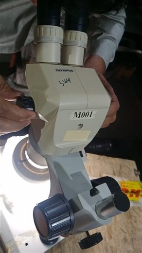 Olympus SZ series stereo zoom microscope head,