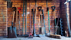 DIY A Simple Wooden Storage Rack To Keep Yard Tools Organized In Your Garage - Hunker