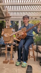 Everyone meet Herman!! He's made almost completely of cardboard, duct tape, and hot glue, and controlled by my beautiful Squidward Crocs, and my banjo hand. I think he's pretty awesome. | Phoebe Sanders Banjo