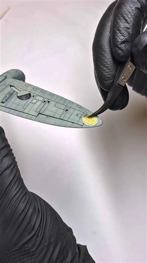 Work in progress… “I painted the roundels, codes & tail markings on the 1:72 scale Spitfire Mk.Ia before the camo & sky underneath. Next up is a clear coat to seal in then onto some weathering.” 📹 Ig/ angliaplanemodeller In stock: https://ow.ly/1RqO50Yf2EJ 👈 #Airfix #ScaleModelling #ScaleModels #Spitfire | Airfix