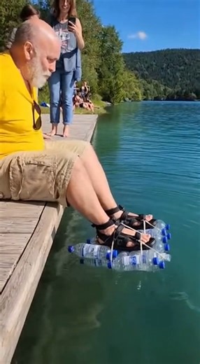 Man Floats on Water Using Only Bottles Tied to His Feet | StorIRL