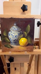Paola Luther on Instagram: "The light blue pattern on the jar gracefully shifts to a deep blue in the shadows, adding depth and vibrancy to this charming still life. The bright citrus and gestural leaves bring movement and balance, making the composition feel lively and inviting. Via: @lutherpaola ️ Artwork: Ginger Jar with Lemon, Oil, 8”x8” Art by: @karen.daigleart Remarks by: @paolaportfolio #artworkanalysis #paolaluther Art Lessons: @therealatelier "