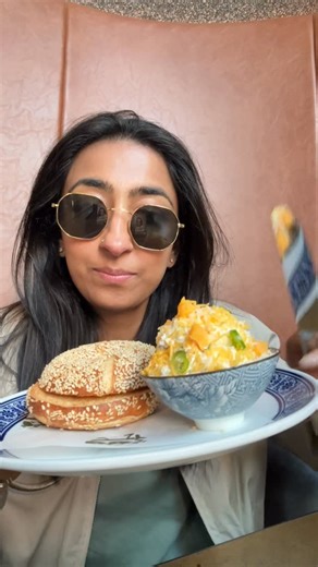 Priti Malik on Instagram: "I had: -Sesame Bagel with Jalapeño Cheese Cream Cheese AED24 (Although my fave cream cheese will always be the scallion! Also the Blueberry Bagel is OUT OF THIS WORLD) -Iced Parle G Latte AED28 -Classic Pineapple Bun + Hong Kong Milk Tea AED30 The bagel was simple and satisfying! The latte is 🤌🏽 and the bun and tea is a very different experience! The hot tea melts the butter in your mouth - WILD! 📍 @852bakerydubai"