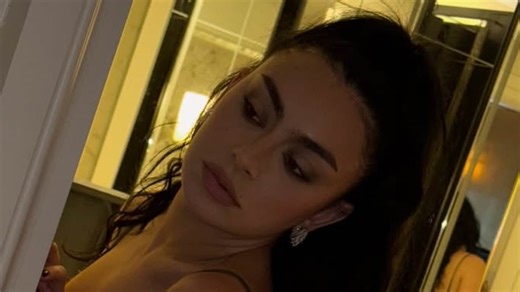 Charli XCX  poses in her underwear while preparing for the Met Gala