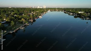 Aerial view of luxury waterfront homes and mansions on a lake in South Florida