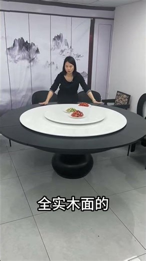 modern round dining table featuring a rotating lazy susan centerpiece and an expandable design