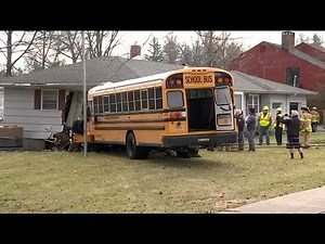 School bus driver who crashed into house charged with DUI
