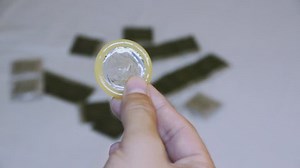 Man Slowly Opens Package Condom Close-up Stock Footage Video (100% Royalty-free) 1019088682 | Shutterstock