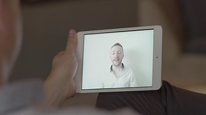 People Having A Call Conference Talking Together on Mobile Tablet Screen