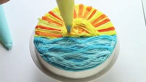 How to make a beautiful Sunset Cake in just minutes! You will never guess what decorating tip I use... Learn More: http://iambaker.net/sunset-cake/ | I am baker
