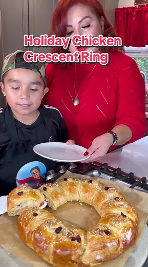 Holiday Chicken Crescent Wreath Recipe Ingredients: 1 big shredded chicken breast 1 diced small green apple 1 diced red bell pepper 1 minced garlic clove 1/4 minced onion 1 chopped walnuts 1 cup cranberries 1.5 cups mayonnaise 1 cup shredded mozzarella cheese 1-2 tbsps diced chipotles in adobo 1/2 tsp crushed black pepper 1 tsp chicken bouillon Salt to taste Toppings: Egg wash Sesame seeds Reserved tiny dough balls 2 (12 oz) Pillsbury Butter Flake Crescents 1 egg white (to brush wreath) Sesame s