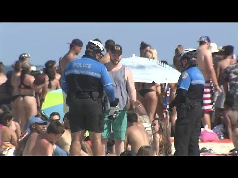 Spring breaker twerks on Miami Beach police ATV