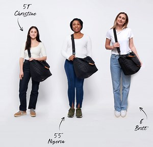 Curious about how the Medium Metro Tote Deluxe would look on you? We had our team model and they proved that whether you're 5'1 or 6 feet tall, it's sure to measure up. Tap to shop: mzw.lc/essentials. #DesignedToDoMore | MZ Wallace